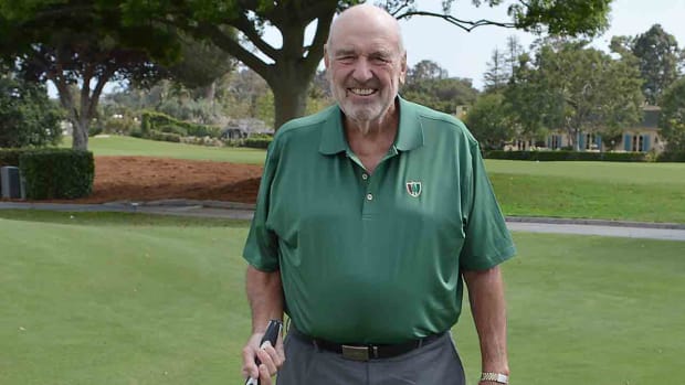 Golf equipment innovator Barney Adams is pictured on a golf course.